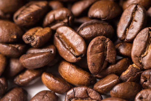 Fullframe pile of brown Roasted coffee beans — Stock Photo, Image