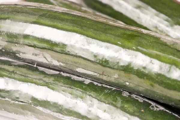 Bunch of cucumber wrapped in plastic films — Stock Photo, Image