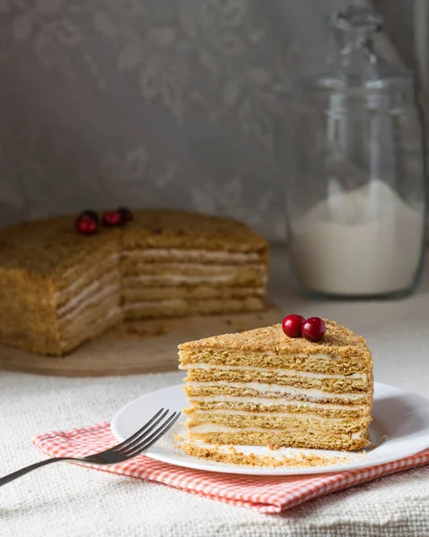 Piece Layered Creamy Honey Cake Decorated Cherry White Plate — Stock Photo, Image
