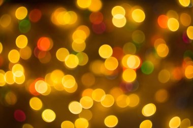Odaklanmamış noel ışıkları arka plan bokeh. Yeni yıl, kış tatili