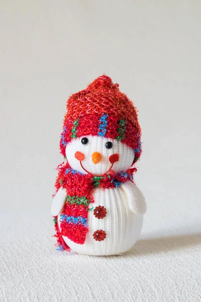 Wool christmas new year toy snowman on white background