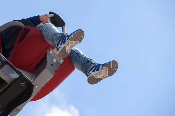 Children Legs Hang Carousel Seat High Blue Sky Carnival Fun — Stock Photo, Image