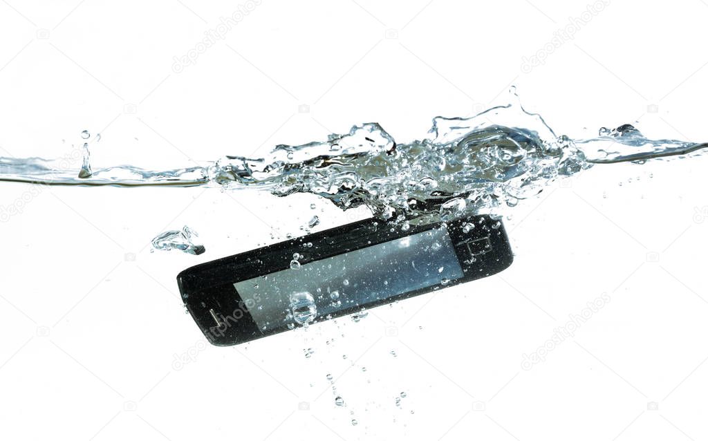smartphone is falling into the water with splash, concept for waterproof product or insurance claim, isolated on a white background, copy space