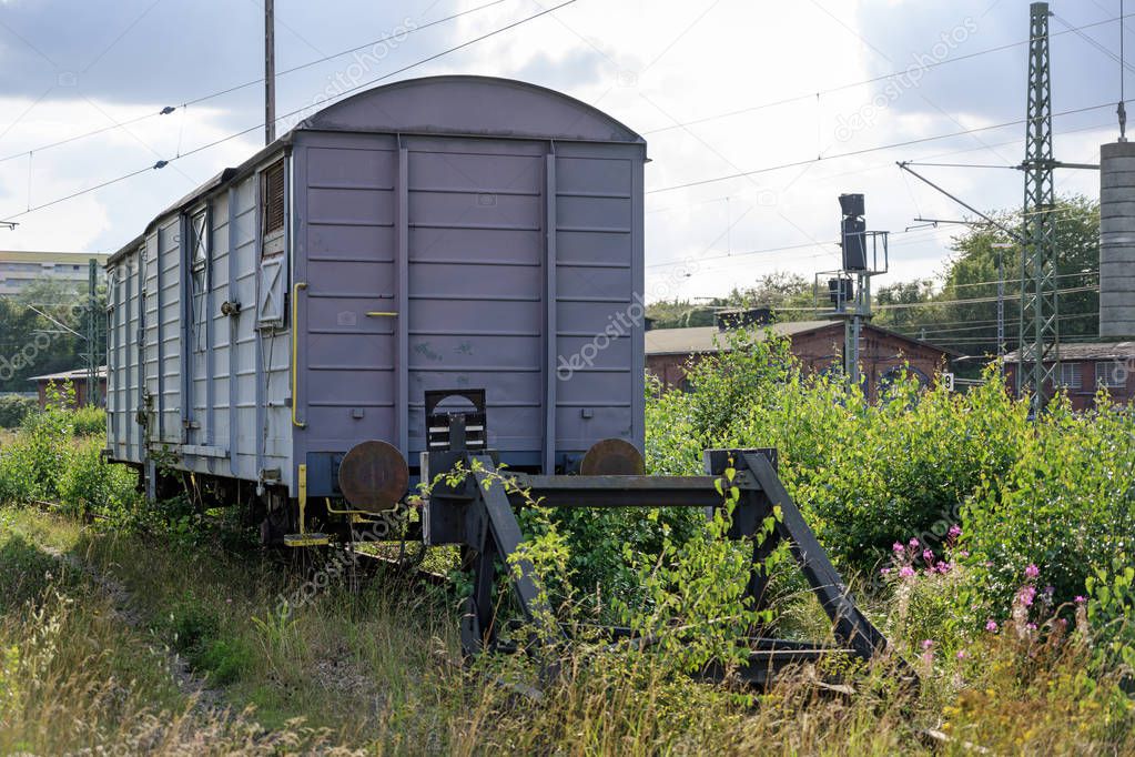 old freight railway car on the sidetrack