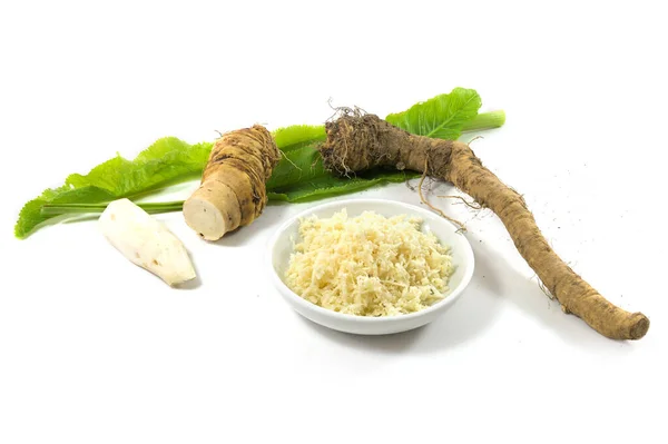 Grated Horseradish Small Bowl Fresh Roots Young Leaves Isolated Shadows — Stock Photo, Image