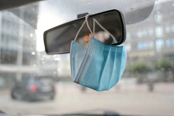 Surgical Face Mask Protection Covid Infection Hanging Car Rear View — Stock Photo, Image