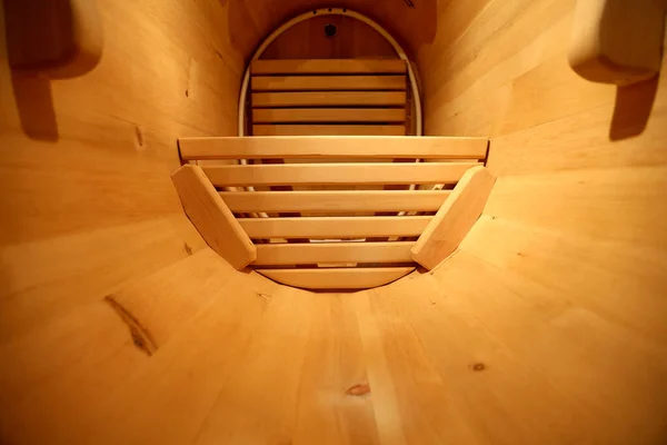 Sauna in a barrel. Beauty salon, pampering. Cedar barrel in the spa. Cabinet for cosmetology procedures, rest and recovery. Spa. Wellness and skin care.