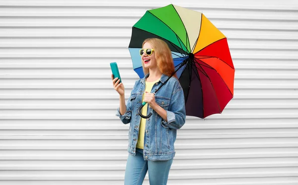 Happy Woman Laughing Smartphone Having Video Call Holds Colorful Umbrella — Stock Photo, Image