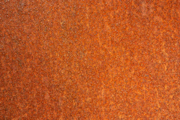 The background is a rusty orange metal surface for an inscription or banner. Pattern textured rust surface Royalty Free Stock Photos