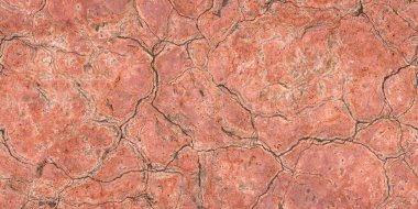 Eski duvar yüzeyinin dokusu çok sayıda çatlak, sıyrık ve düzensizlikle renklidir..