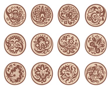 Etnik çiçek unsurları olan bir grup daire