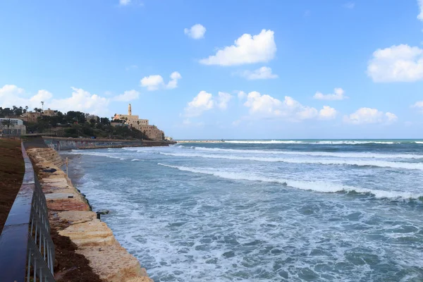 Coastline panorama of city Tel Aviv Jaffa with mediterranean sea and St. Peters Church in Israel — Stock Photo, Image