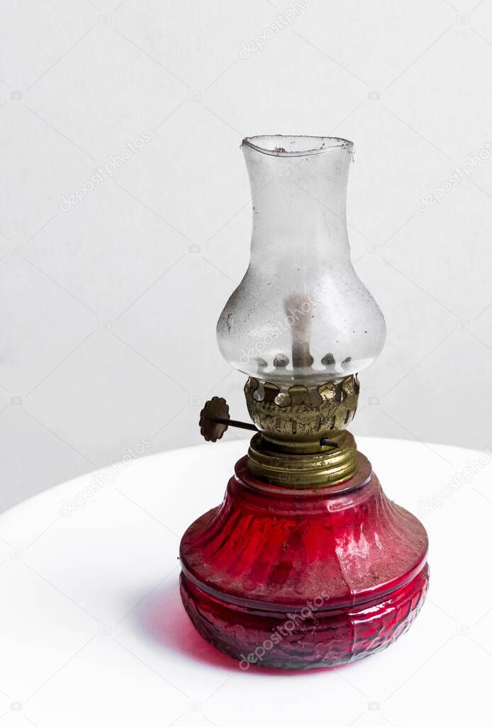 Traditional oil lamp of Indonesia isolated in white background. Traditional handmade's lamp