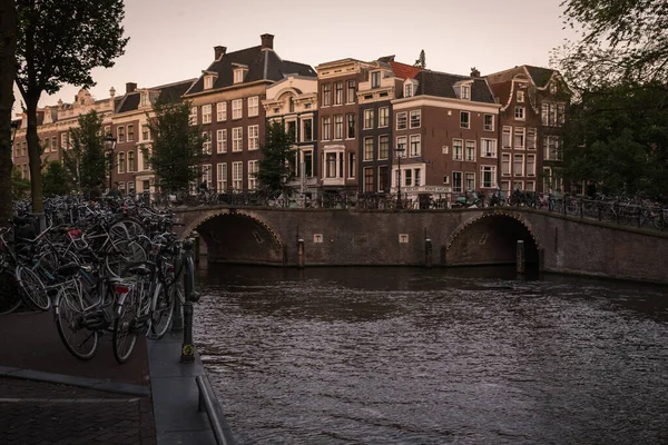 Typical Dutch Houses Bicycles Canal Sunset Amsterdam Netherlands — Stock Photo, Image