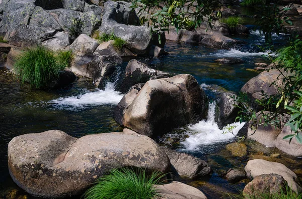 Calm river flows forming small waterfalls, Las Batuecas Natural Park, Salamanca, Spain