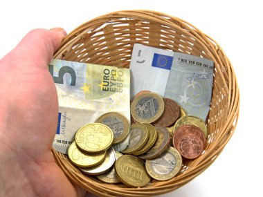 Hand holding a basket for collecting money clipart