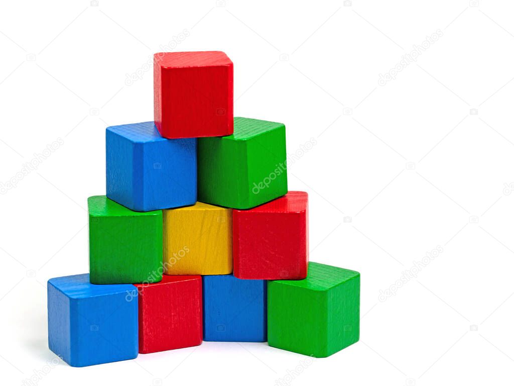 Colorful wooden toy blocks against white background