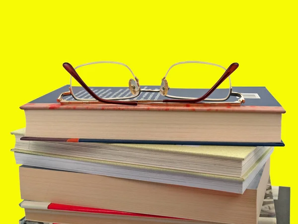 Stacked Books Yellow Background — Stock Photo, Image