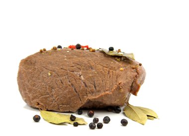 Beef roast marinated with spices against white background clipart