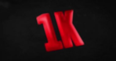 1K, 1000. Parlak kırmızı kelime canlandırması