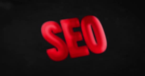 SEO. Glänzend rote Wortanimation — Stockvideo