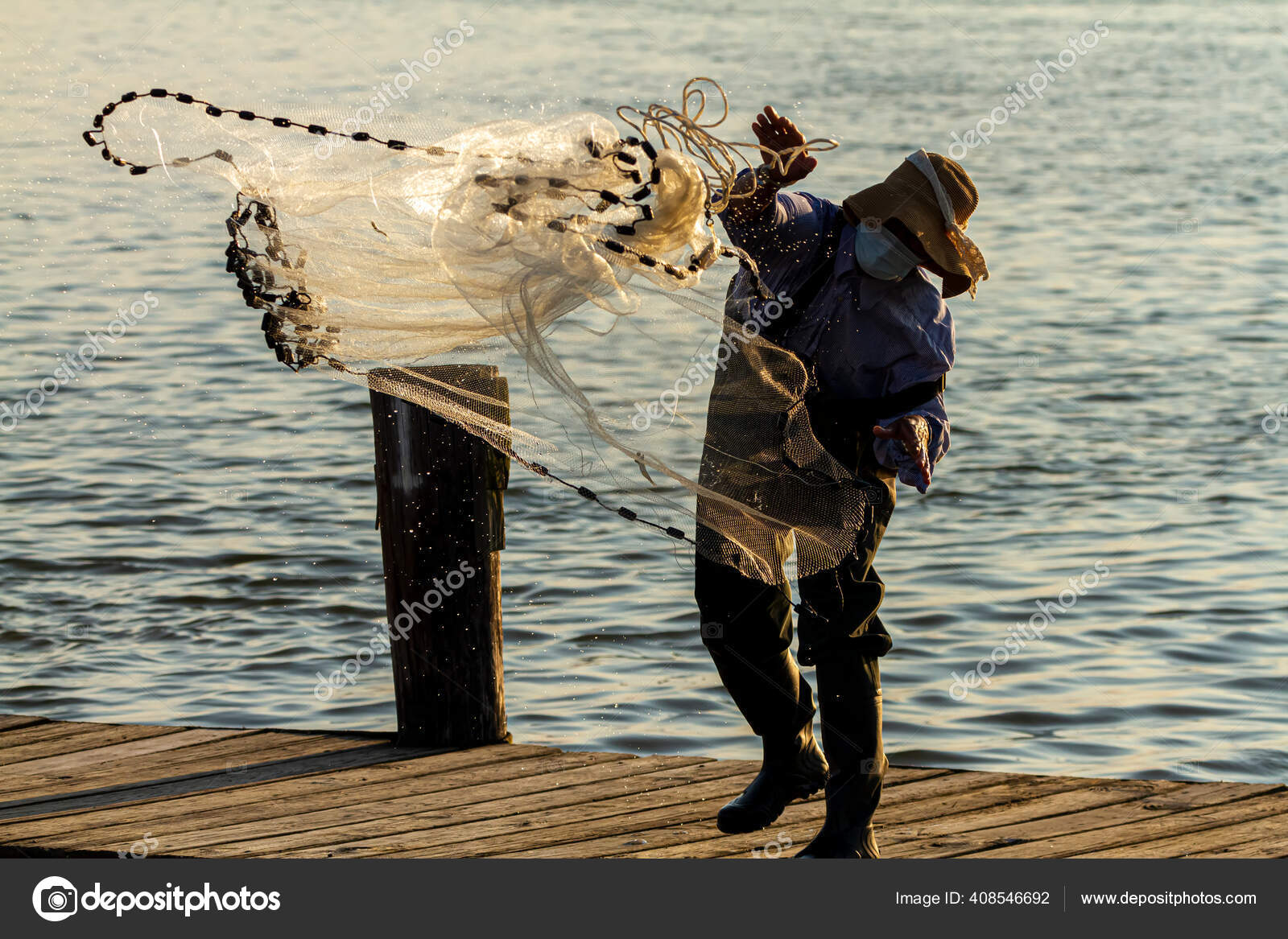 Fisherman Wearing Overalls Boots Well Bucket Hat Throwing Cast Net Stock  Photo by ©grandbrothers 408546692