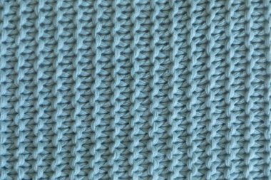 El yapımı mavi örgü yün doku arka plan