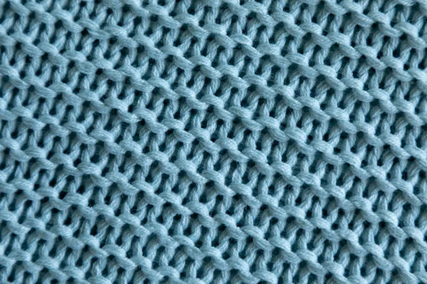 Kötés, gyapjú textúra háttér kézzel kék — Stock Fotó