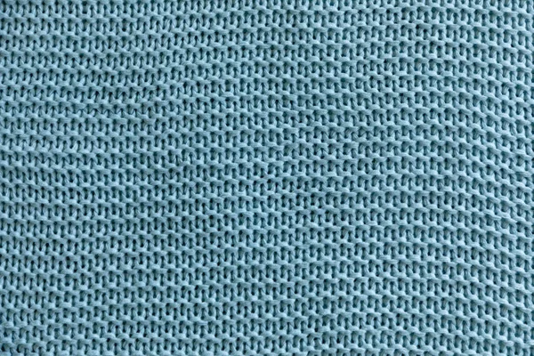 Handmade blue knitting wool texture background