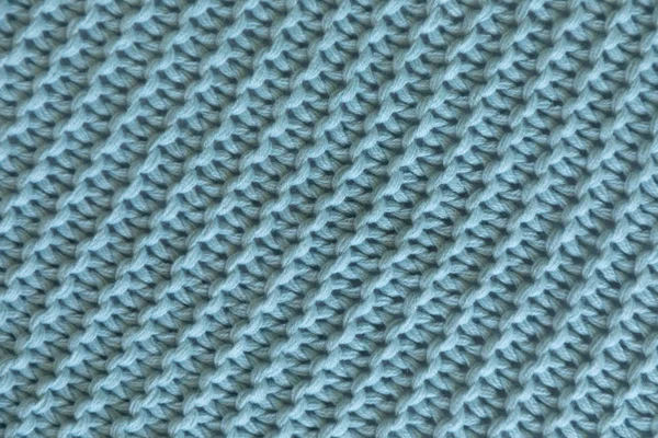 Handmade blue knitting wool texture background, knitted blanket