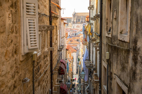 Dubrovnik, Croatia - 20.10.2018: Medieval narrow street in old town of Dubrovnik in Croatia