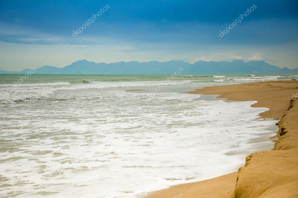 Sand beach in Paestum in cloudy day in winter, Cilento, Italy