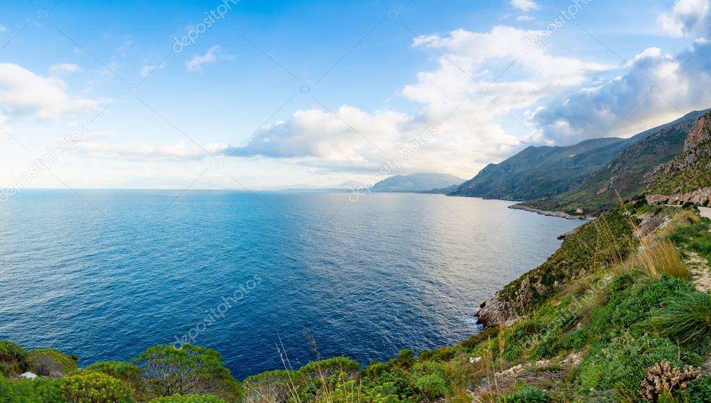 View of mountains and blue sea in the Italian natural reserve or Riserva dello Zingaro in Sicily, Italy