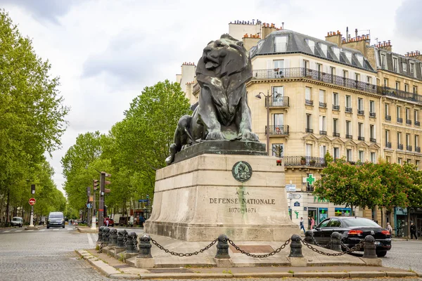 Paris, France - 24.04.2019: Lion of f Belfort statue in Denfert Rochereau square in Paris, France — Stock Photo, Image