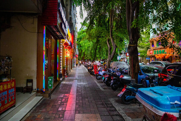 Sanya, Hainan, China - 26.06.2019: Street Life in Sanya City. Qun Zhong Jie, Tianya Qu, Sanya Shi, Hainan Sheng., China