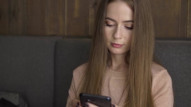 Smartphone Girl Using App On Phone Sitting In Cozy Cafe Beautiful