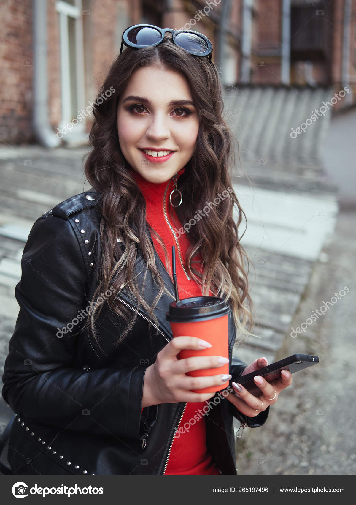 Young Adorable Brown Haired Teen Lady With Bright Trendy Makeup Young Adorable Brown Haired Teen Lady With Bright Trendy Makeup Smile In Red Dress Black Leather Jacket