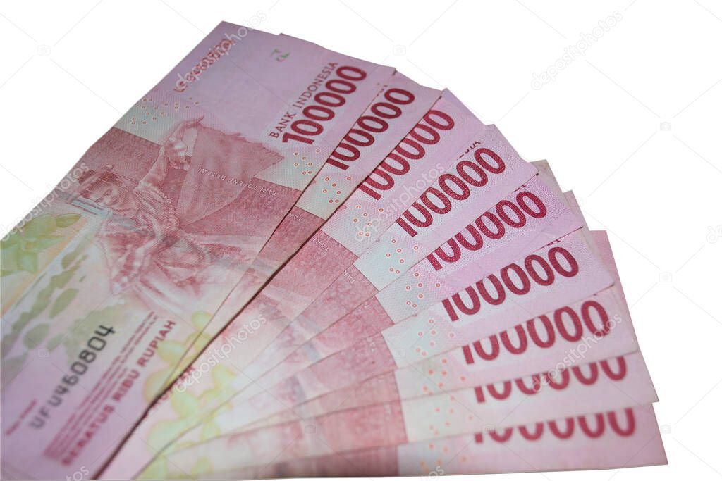 Indonesian money currency lined on a white background