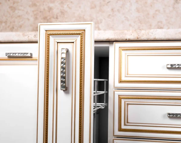 classic white kitchen with golden patina. Dear original Italian classic cuisine. Individual order. Facade of solid wood.