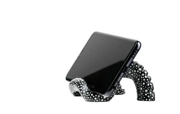 Isolierte Innovative Ständer Für Das Telefon Form Eines Oktopus Tentakels — Stockfoto