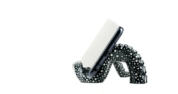 Ізольована Інноваційна Підставка Телефону Вигляді Восьминога Щупальця Білому Тлі Смартфон — стокове фото