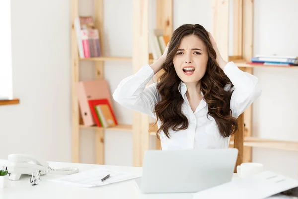 Worried stressed depressed office worker business woman. Looking desperate and confused. Disciplinary action and dismissal.Getting fired.Problems at work