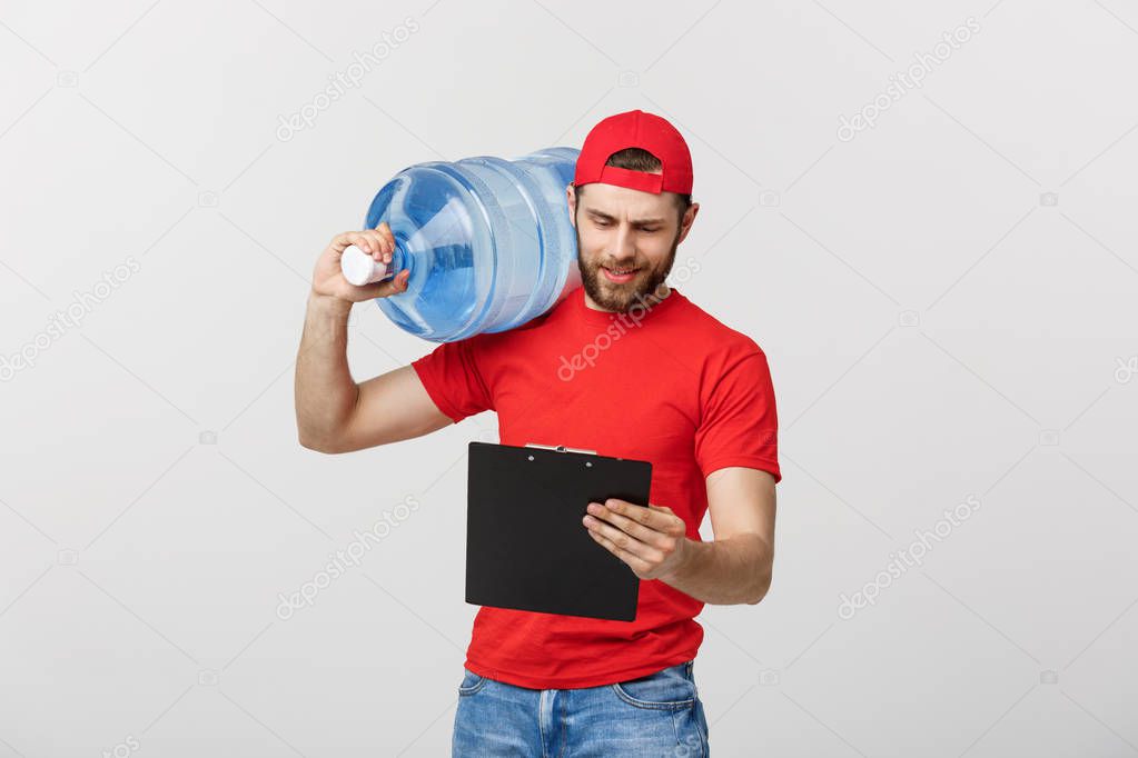 delivery service and people concept - happy man or courier with bottle of water and document with serious facial expression