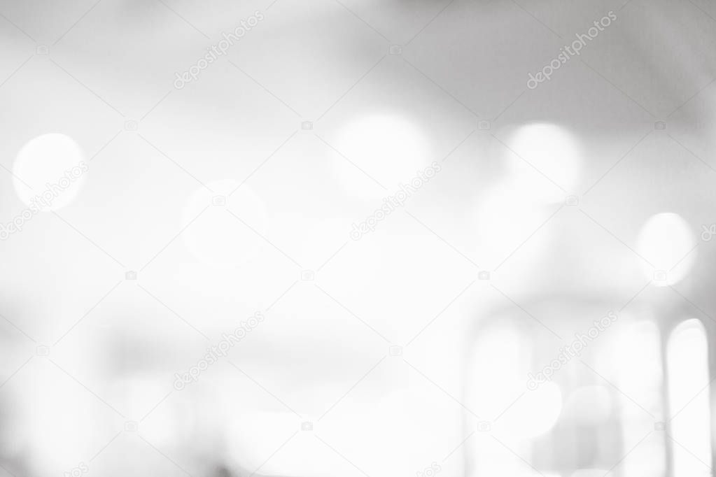 Grey or White blurred of department store background. Defocused blur background.