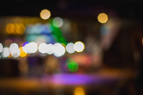 Rozmazané oddělení obchod v noci s pozadím bokeh. — Stock fotografie