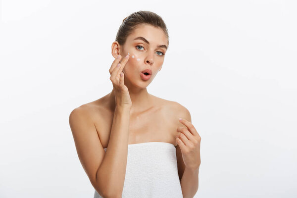 beauty girl of caucasian woman checks her skin, skin care, acne treatment.