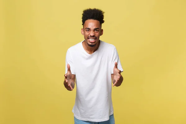 Human facial expressions, emotions and feelings. Portrait of mad angry young dark-skinned male dressed casually. — Stock Photo, Image