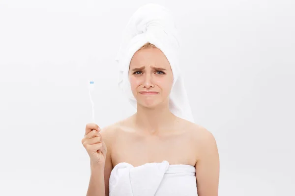 Stock image Disappointed young beautiful model sad with her skin on white background.