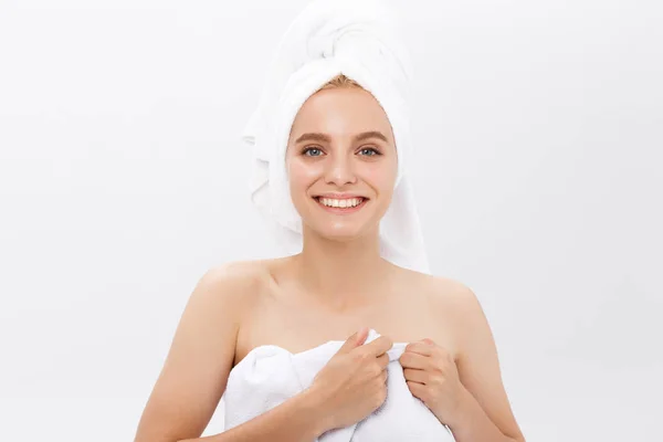 Beautiful woman in a white towel on a head isolate on white — Stock Photo, Image
