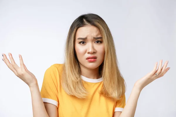 Portrait of sad crying pensive mad crazy asian woman. Closeup young asian woman isolated on white background. — Stock Photo, Image